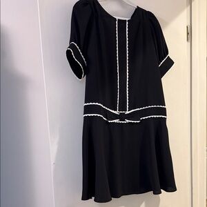 Chic Black Mini Dress with White Accents